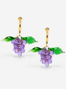 Handmade grape earrings with gold hoops and purple beads.