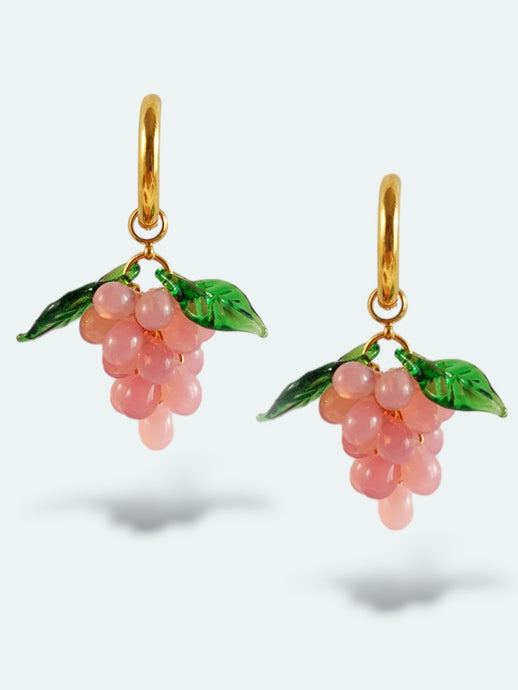 Handmade gold plated hoop earrings with grape charm. Made with glass drops in opal pink color.