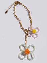 Load image into Gallery viewer, Handmade necklace with colorful glass-bead flowers and a chunky gold-plated chain.