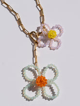 Load image into Gallery viewer, Handmade chunky necklace with colorful glass-bead flowers and a chunky gold-plated chain.