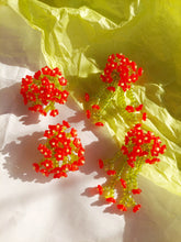 Load image into Gallery viewer, Handmade statement colourful flower beaded earrings with a retro style.