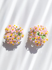Handmade statement flower beaded earrings with a retro style.