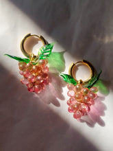 Load image into Gallery viewer, Gold hoop earrings with a handmade glass grape charm. The perfect gift for women who love colorful jewelry.