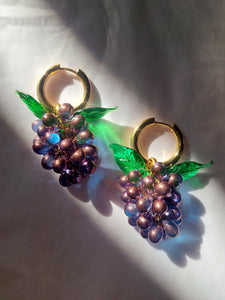 Grape earrings made with glass beads.