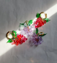 Load image into Gallery viewer, Handmade gold hoop earrings with grape charm made of red glass beads.